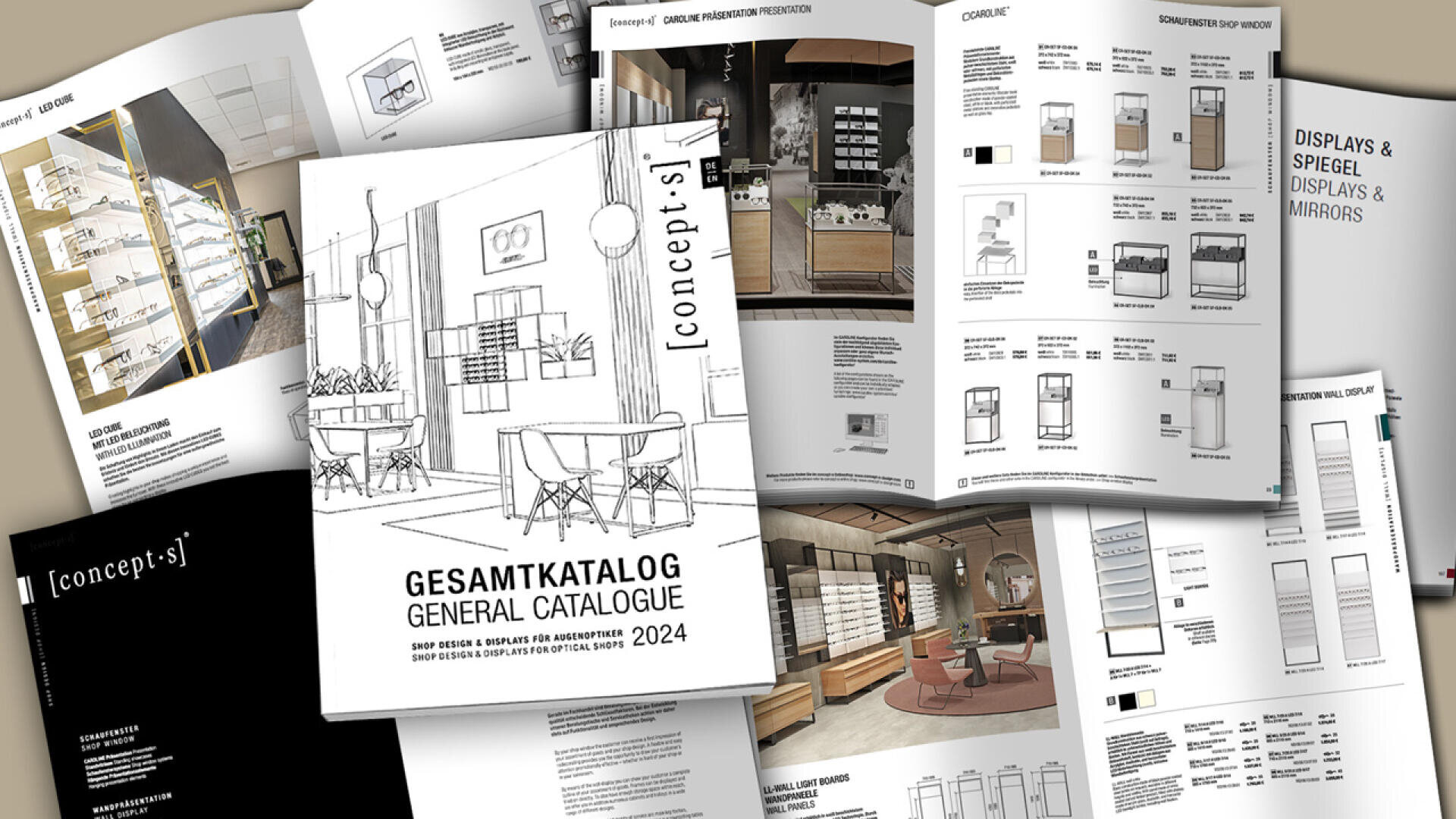Eine Reihe aufgeschlagener Katalogseiten mit Produktbildern, Skizzen, Displaydesigns und technischen Diagrammen, mit einem zentralen Cover mit der Aufschrift „Hauptkatalog 2024 von concept-s“, mit Schwerpunkt auf Ladenbau- und Displaylösungen.