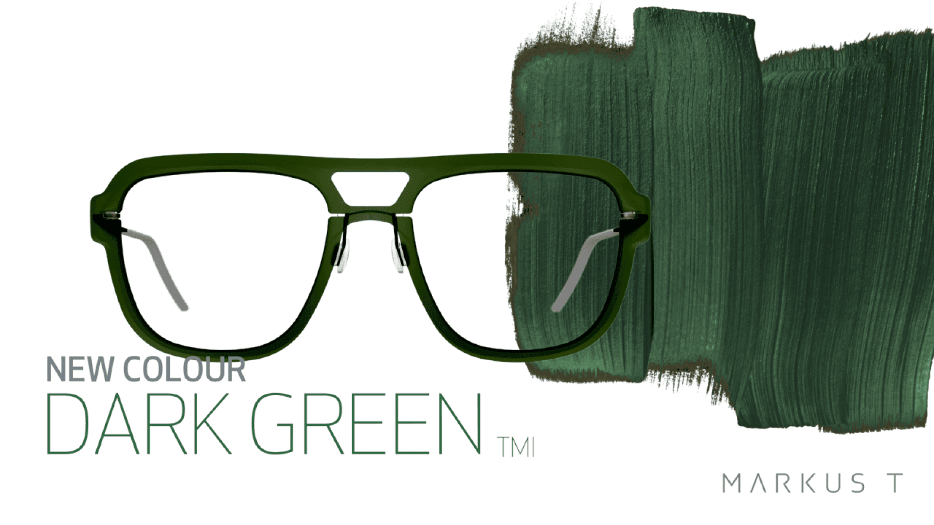 A pair of dark green eyeglasses is centered over a brushstroke of matching green paint. Text reads New Colour DARK GREEN™ and MARKUS T in the bottom right corner.