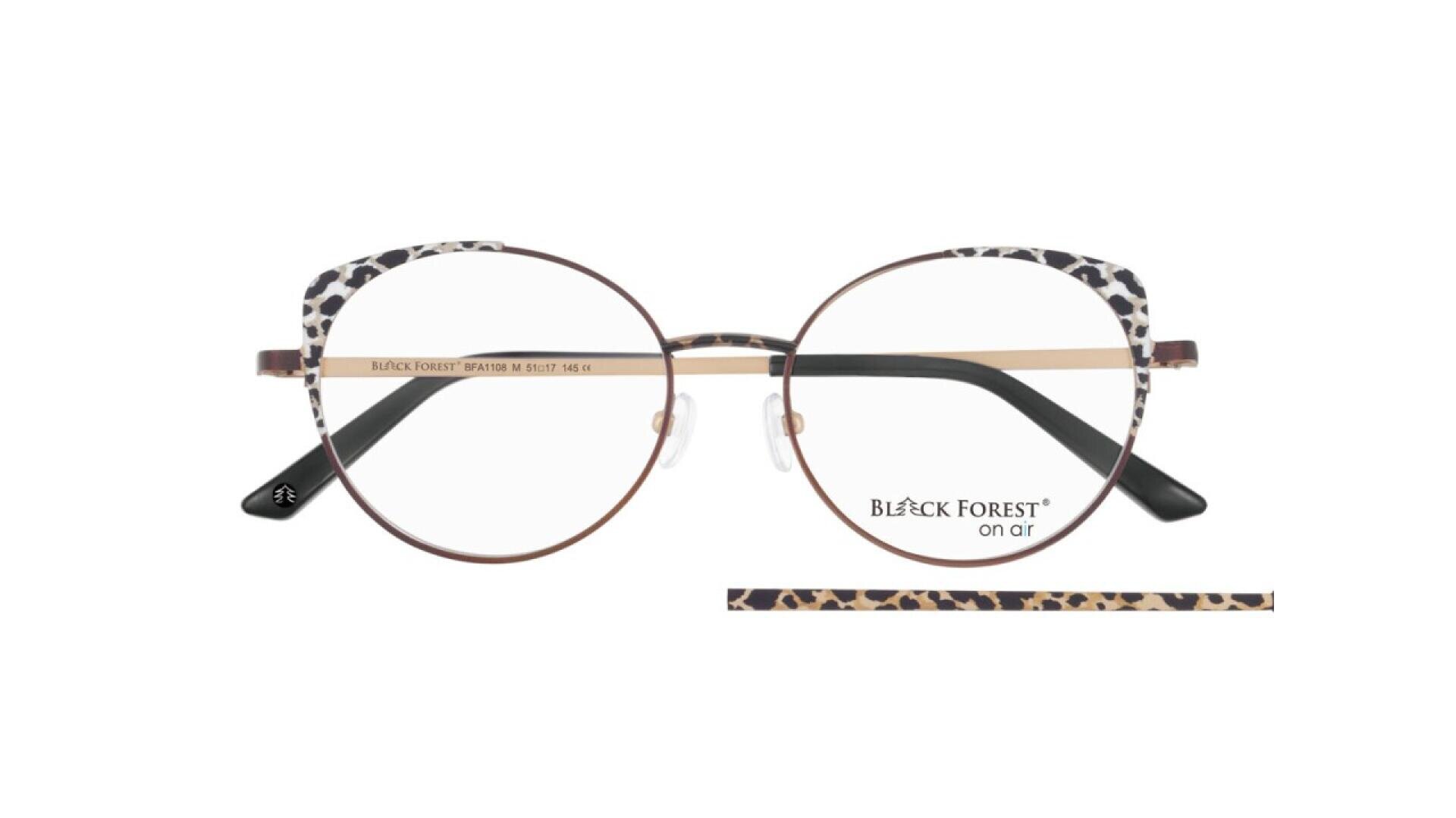 Round eyeglasses with thin metal frames, featuring a black and beige leopard print design on the upper rims and temple tips. The brand Black Forest on art is visible on the right lens.