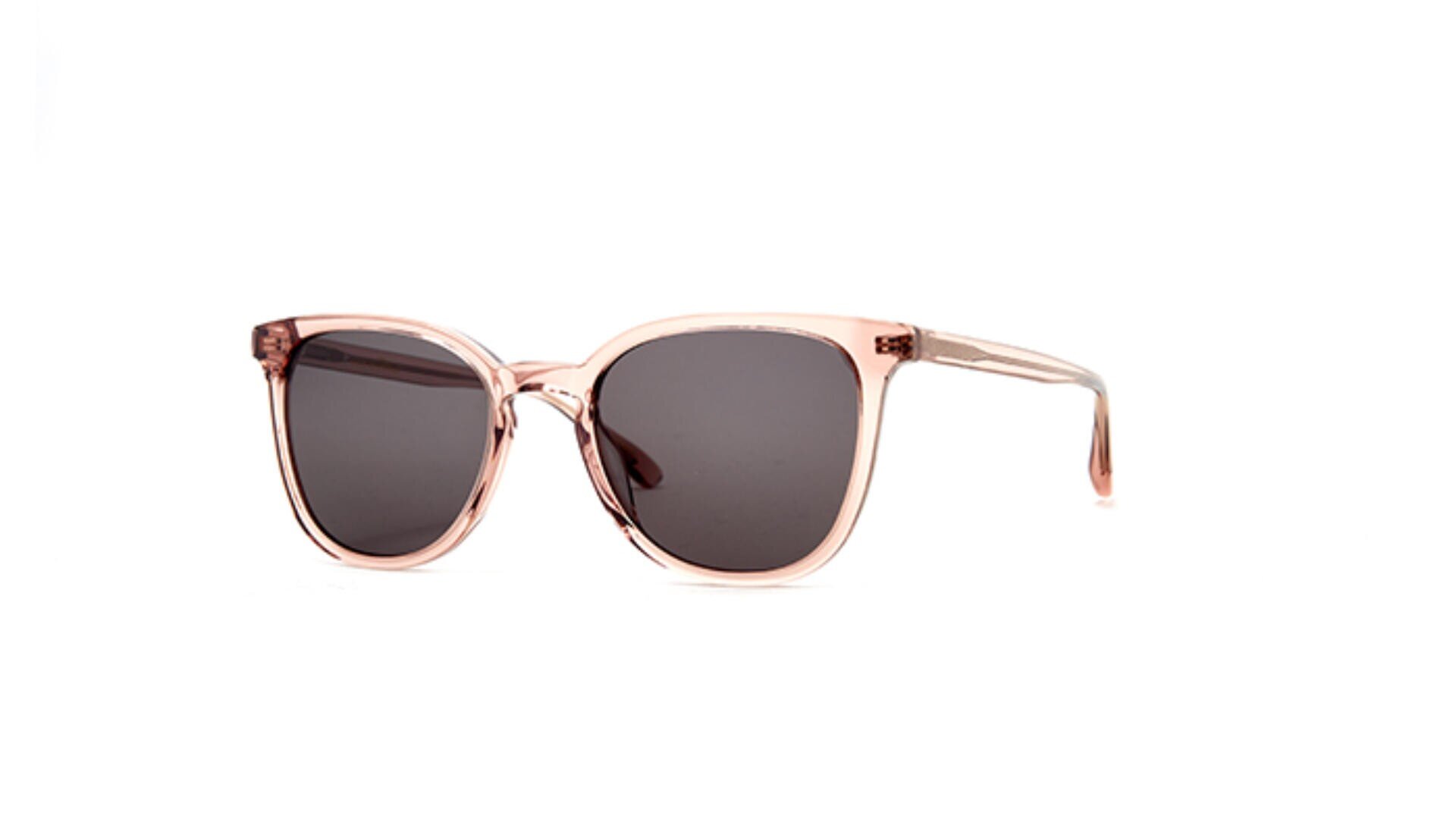 A pair of sunglasses with light pink transparent frames and dark lenses, displayed on a white background.